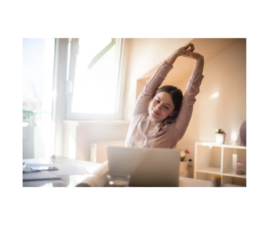 Woman Stretching at Desk