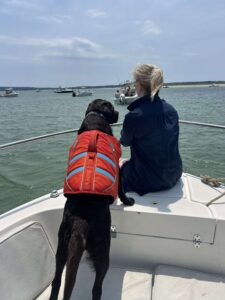 Sandy and Cooper on the Boat in Plymouth, MA.
